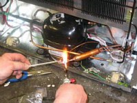 /album/galeria-de-fotos/montando-motor-de-geladeira-jpg/